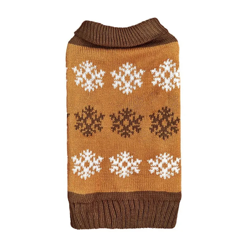 Grey dog sweater with white snowflake pattern on a small dog, showing knitted acrylic texture.
