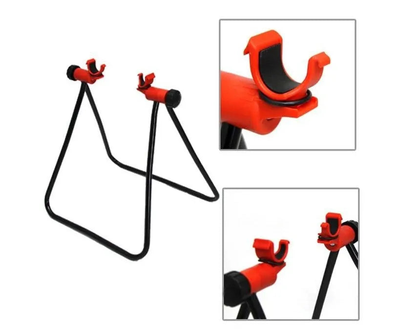 Foldable aluminium alloy bicycle repair rack in black with 3-way micro-adjustment and chain stay mounts on a flat surface