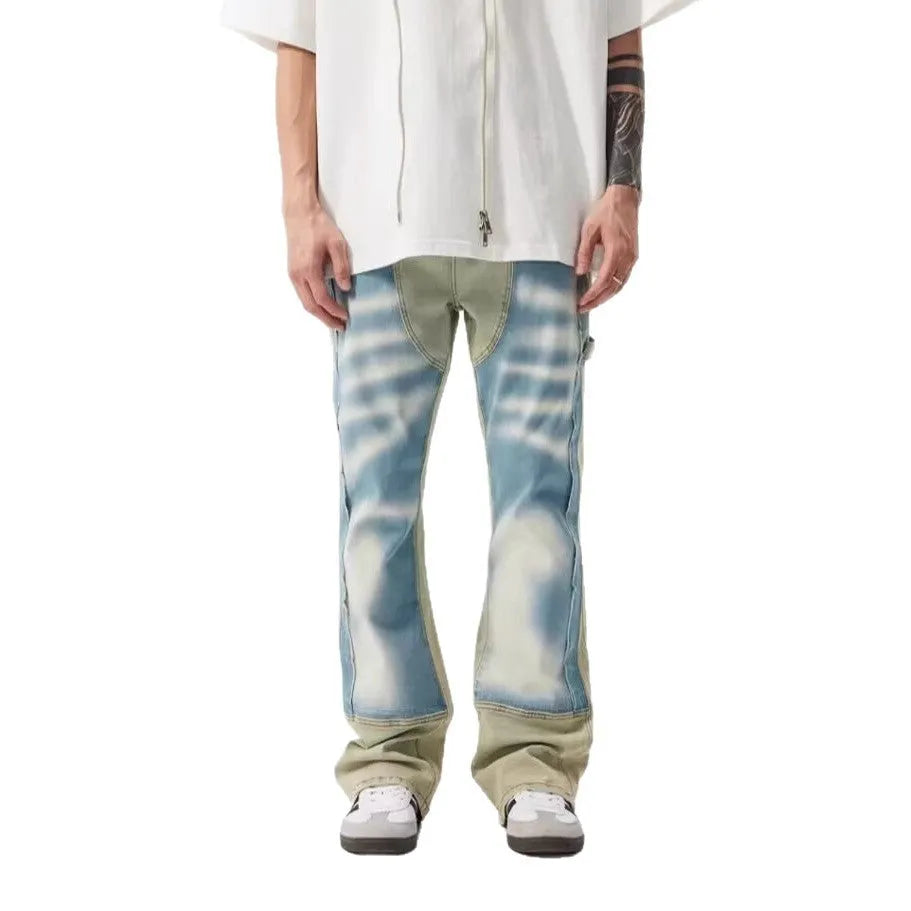 Retro dual-colour patchwork jeans with splash ink damaged design on denim trousers