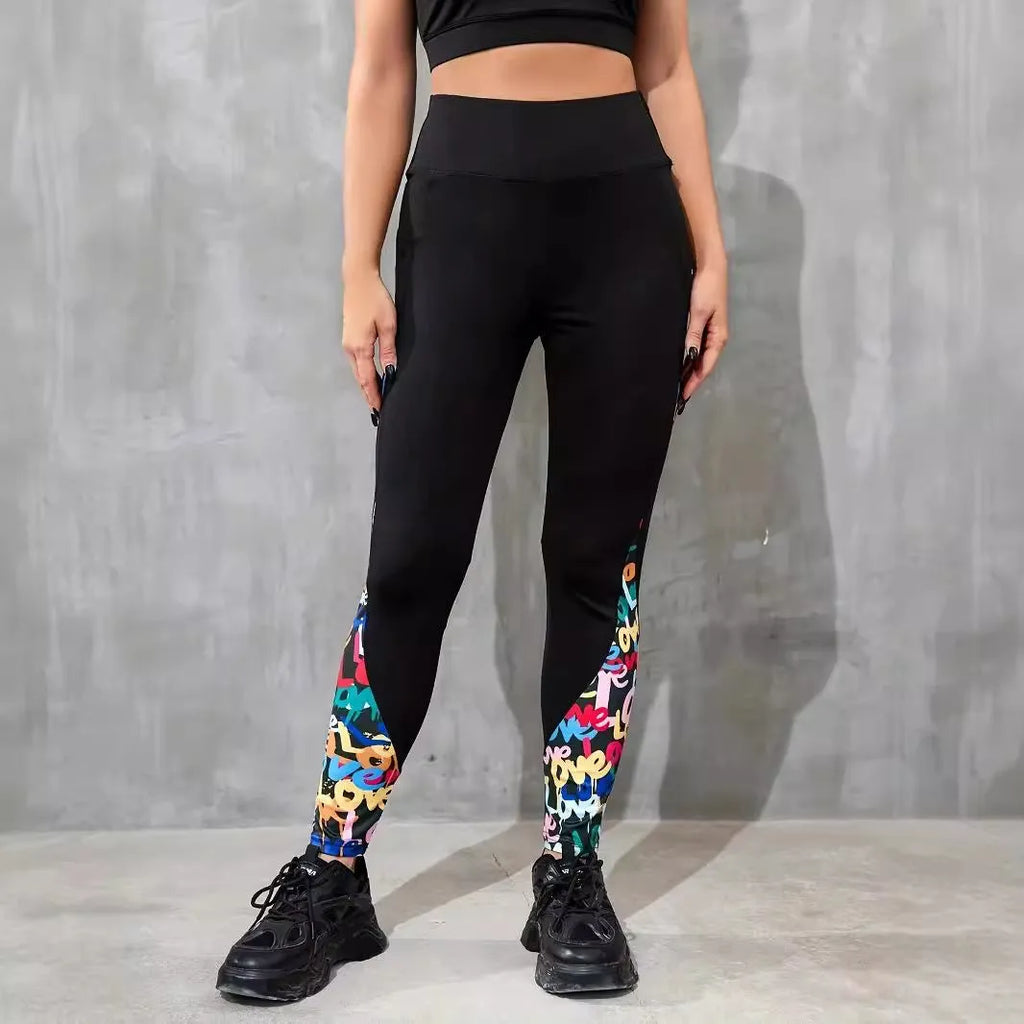 Women's black high waist yoga leggings with contrast patchwork leopard print design and side pocket