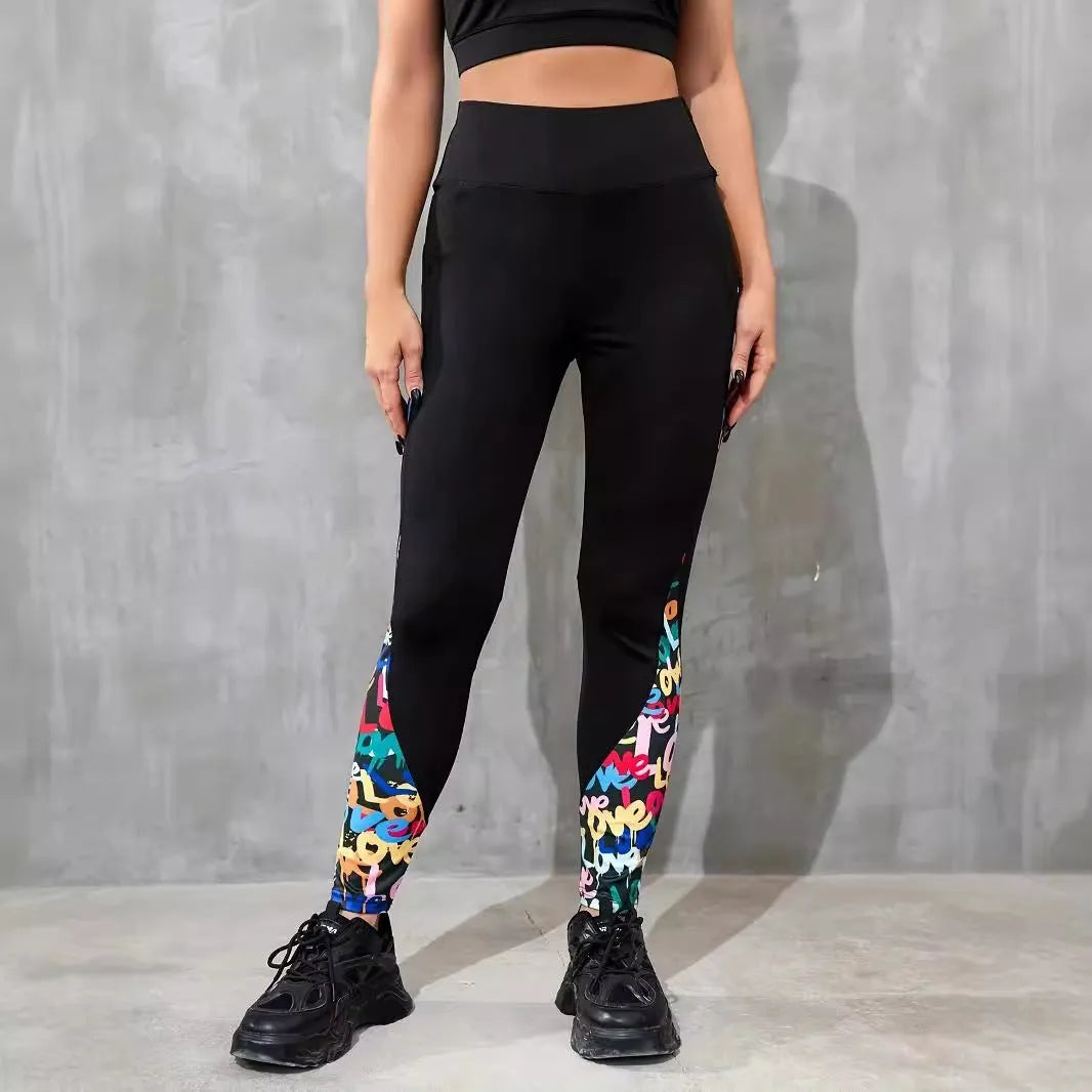 Women's black high waist yoga leggings with contrast patchwork leopard print design and side pocket