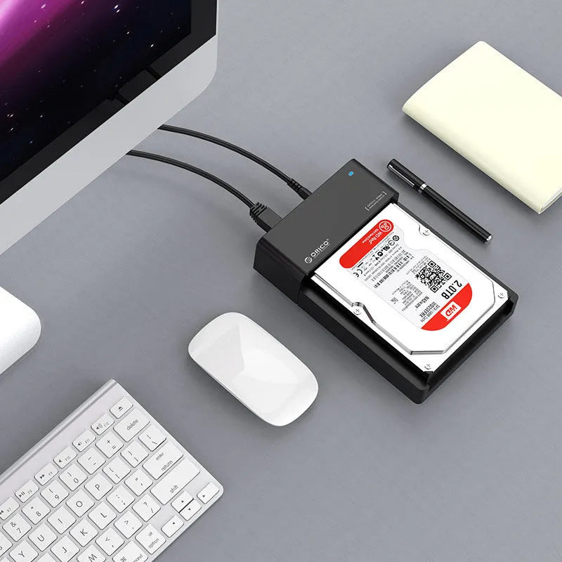 Black 3.5-inch SATA hard drive enclosure box with USB cable for external desktop HDD conversion