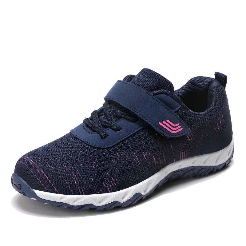 Women's wedge heel shoes with mesh upper and Velcro fastening in four colour options