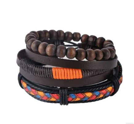 Handmade adjustable leather wrap bracelet with wooden beads on a wrist.