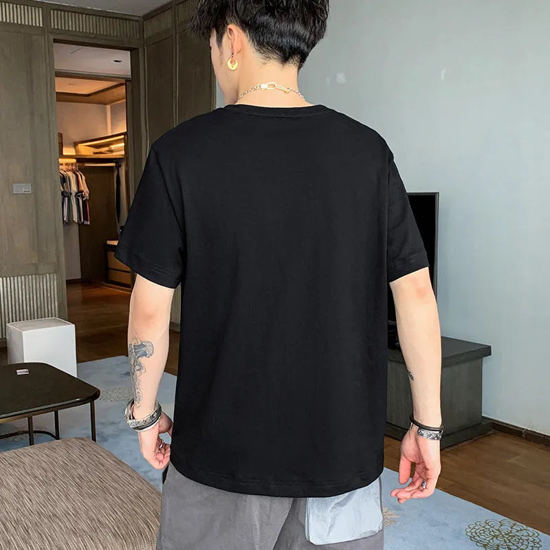 Loose fit boys cotton T-shirt with letter print, round neck and short sleeves, available in multiple colours