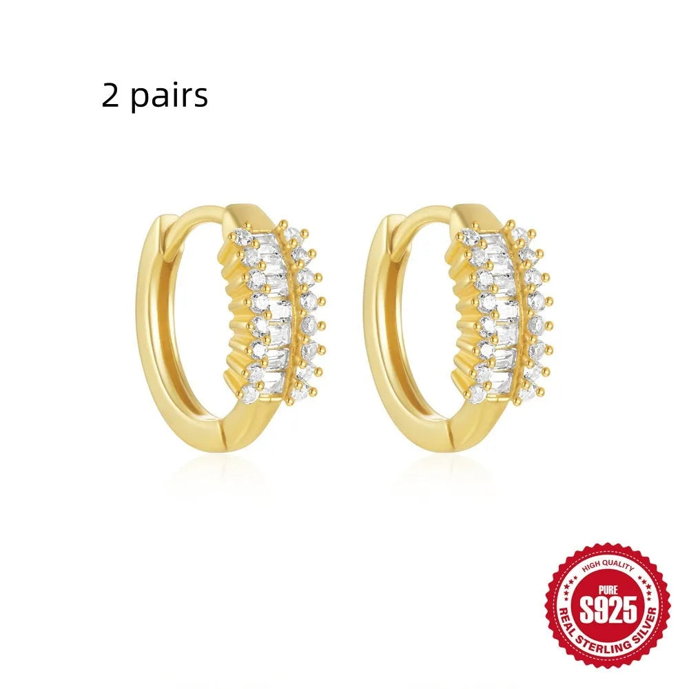 Small round geometric sterling silver stud earrings with diamond accents in gold or silver finish