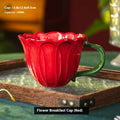 Ceramic breakfast mug with floral pattern, 500ml capacity, in red or purple.