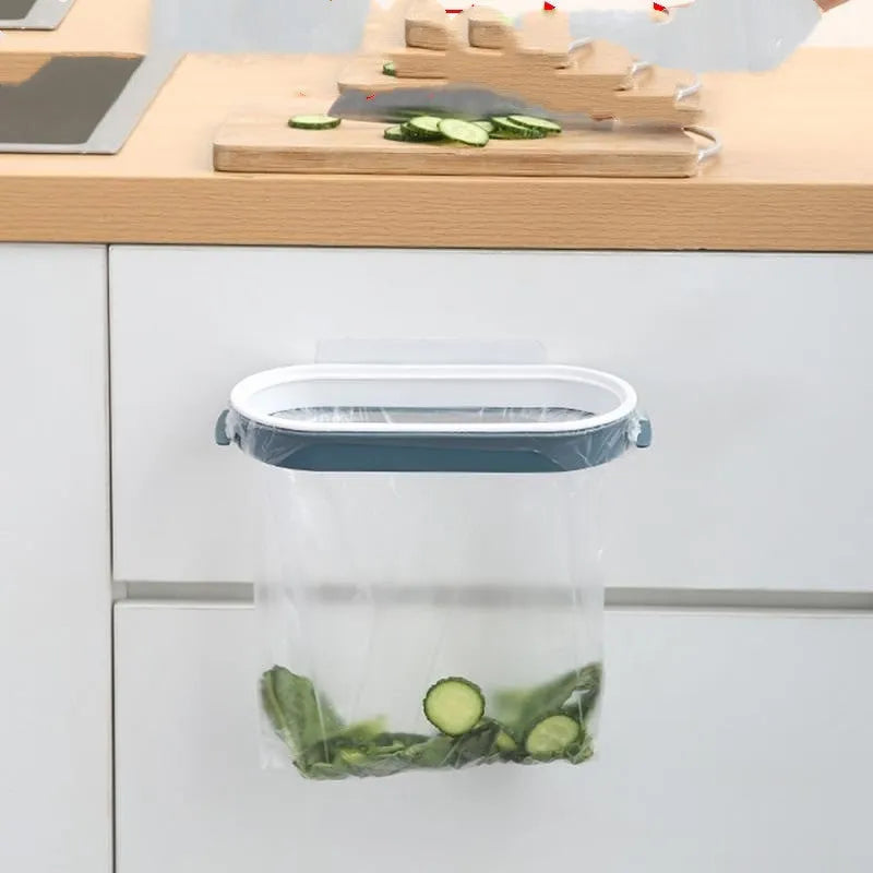 Blue plastic kitchen rubbish bag storage rack with open bench t frame design on a worktop.