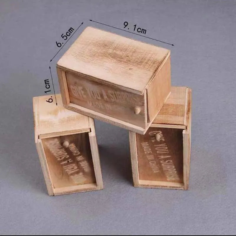 Camellia wood trick box with spider prank element on white background for scary spoof jokes