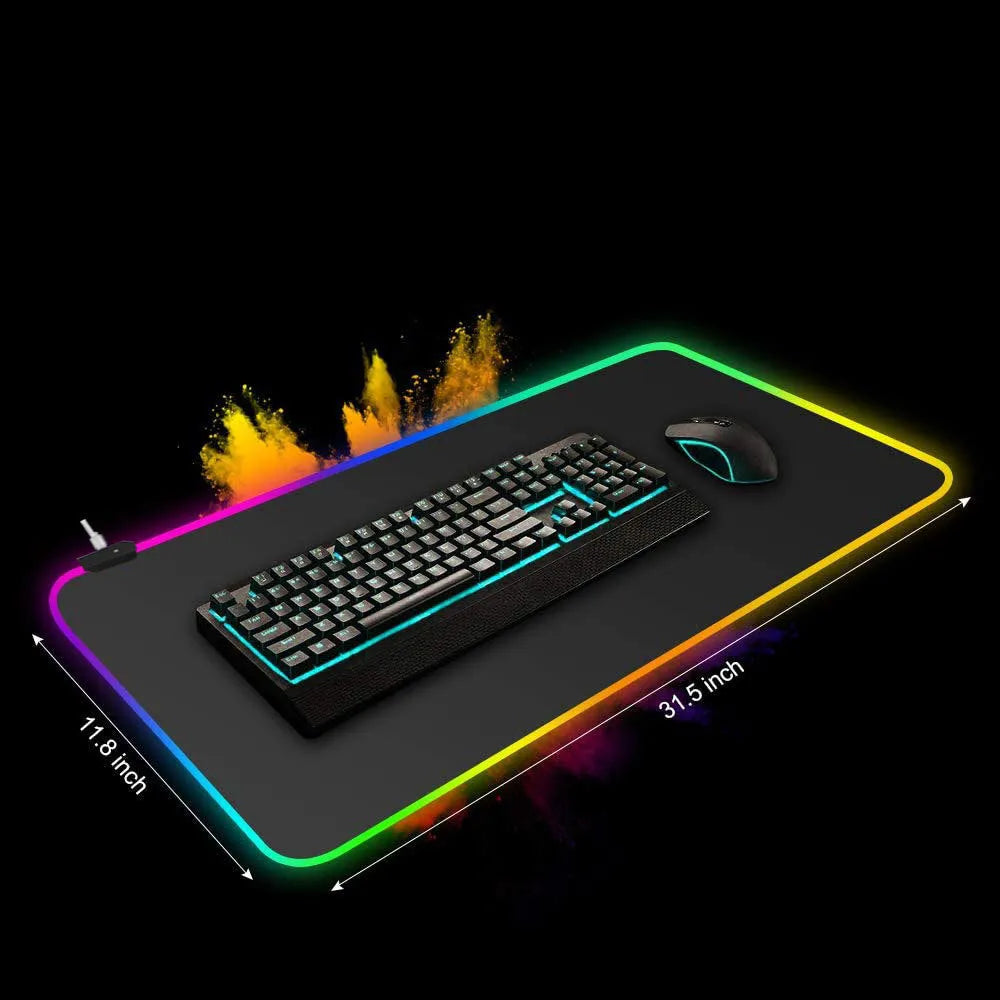 Starry sky pattern RGB luminous gaming mouse pad with USB cable on a desk