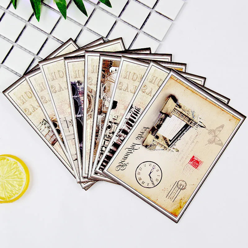 Set of nine minimalist cartoon style postcards depicting global landmarks including a retro Paris tower.