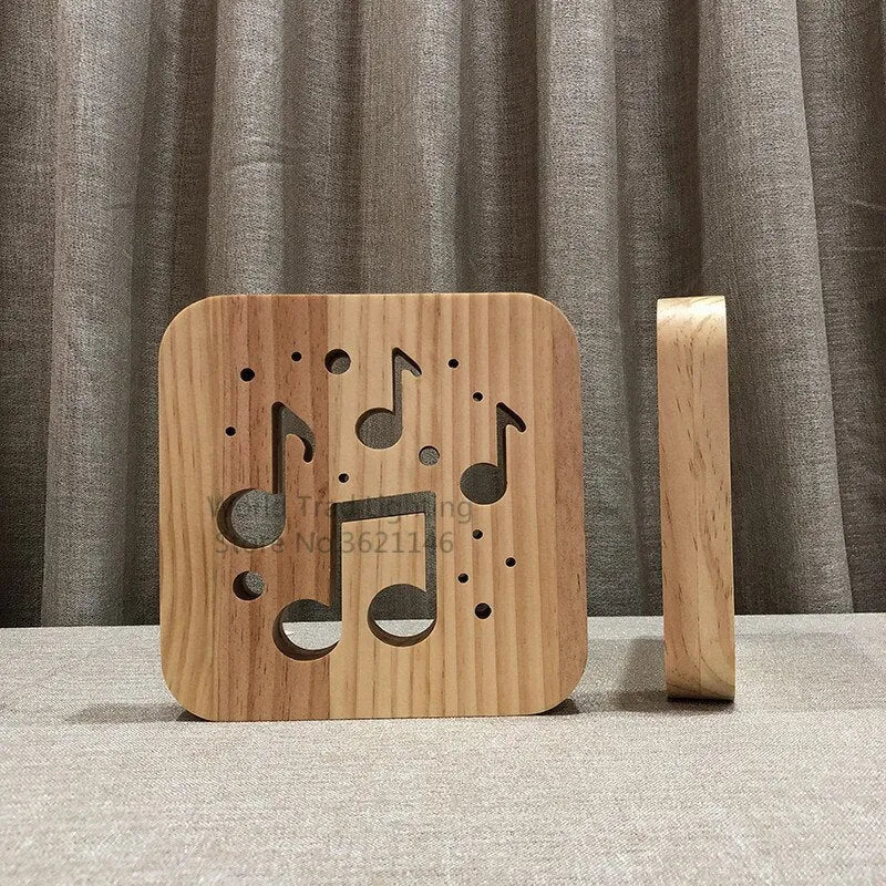 Square pine wood USB LED atmosphere lamp emitting warm white light on a table.