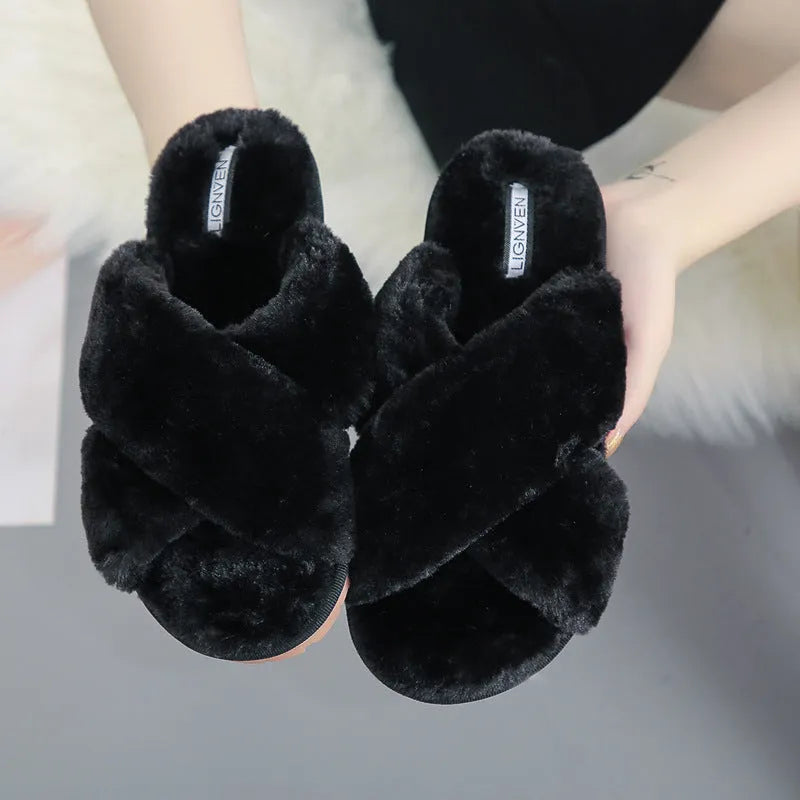 Cross open-toe fur slippers with non-slip patterned sole on tiled floor