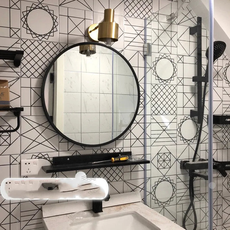 Round metal frame bathroom wall mirror in black finish showing 30cm diameter