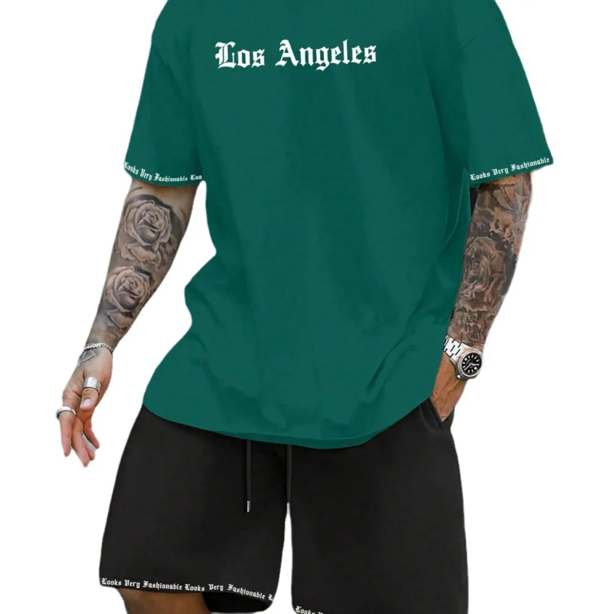 Men's blue short-sleeved sports top and matching shorts suit set on a hanger