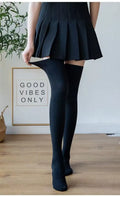 Women's thigh-high stockings in black with over-the-knee tube height and velvet finish