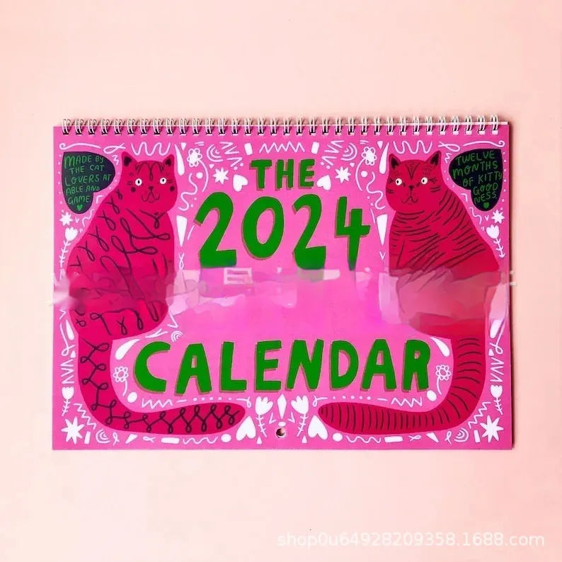 Cat themed wall calendar with monthly tear-off pages for 2024 or 2025.