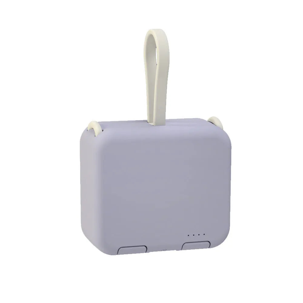 Handbag clip power bank in blue, green, red, or white showing phone stand function and charging ports