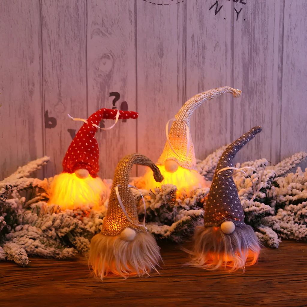 Handmade Swedish forester gnome LED tree pendant with warm light and snowflake details, 8x20 cm, beige colour