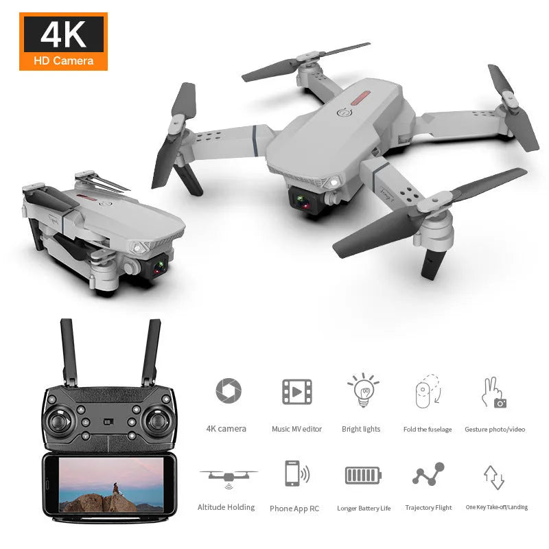 Grey foldable 4K dual camera aerial drone with remote control and spare blades