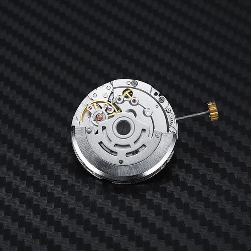 8215 automatic movement replacement with silver stainless steel construction showing 25mm diameter