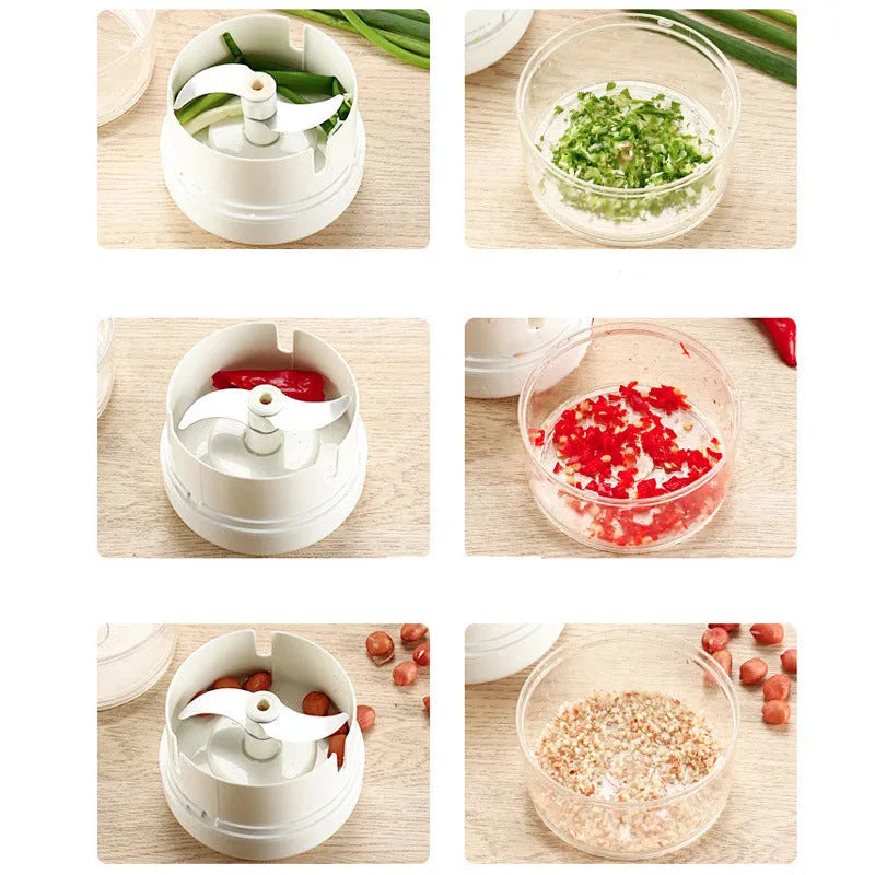 White and silver manual food chopper with stainless steel blades on a kitchen countertop.