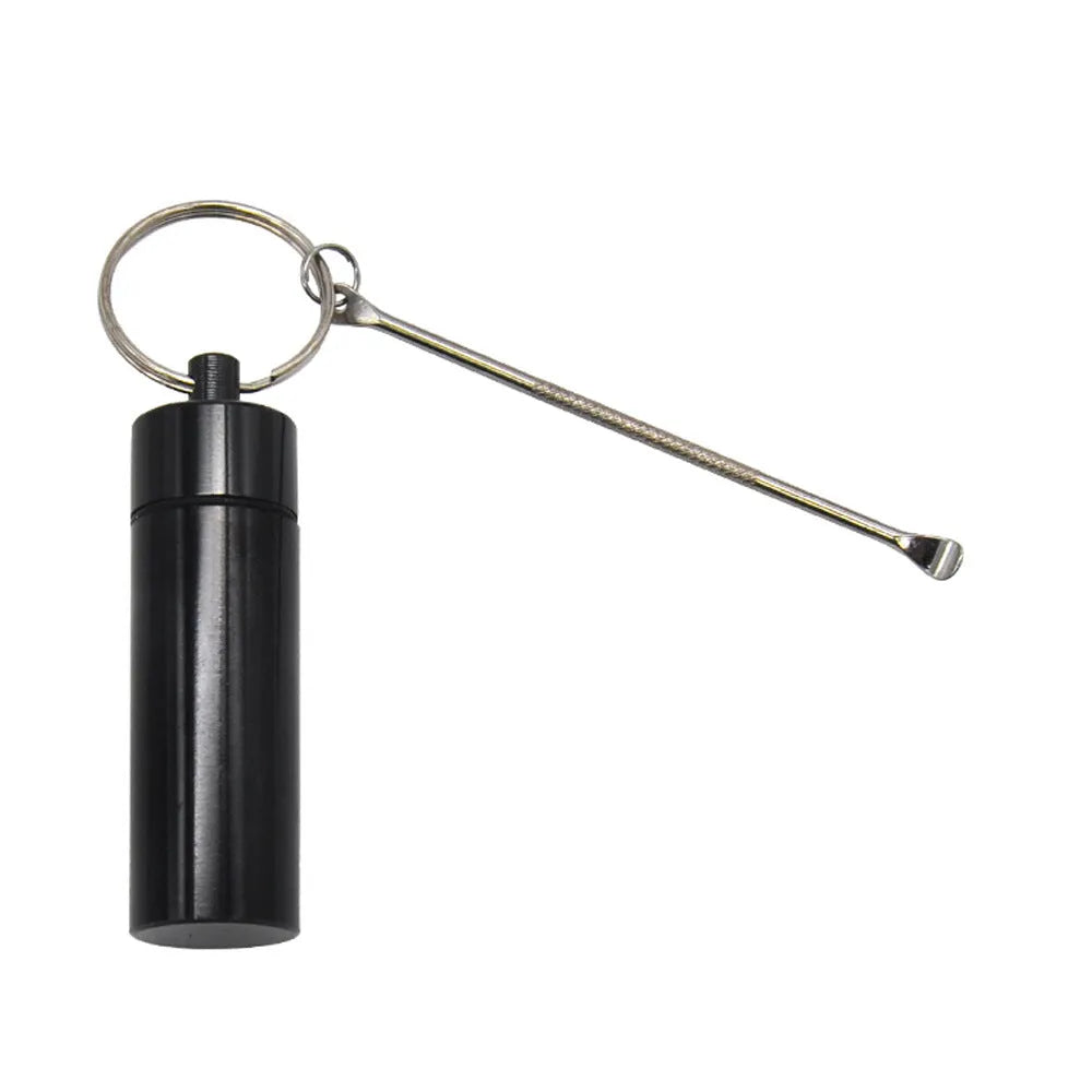 Blue aluminium portable medicine bottle with attached spoon and keychain for medication organisation