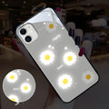 White luminous iPhone case with painted purple daisy design and voice-activated colour light.