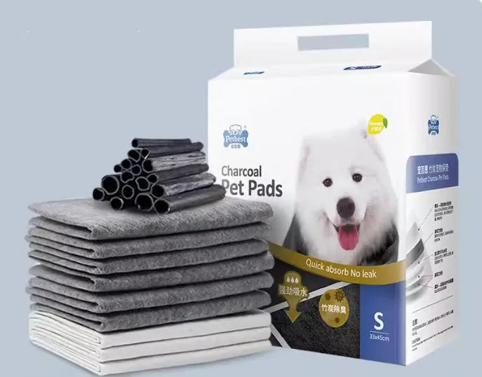 Pack of thickened, absorbent dog urine pads showing lemon scent, blue classic, and bamboo charcoal variants in different sizes.
