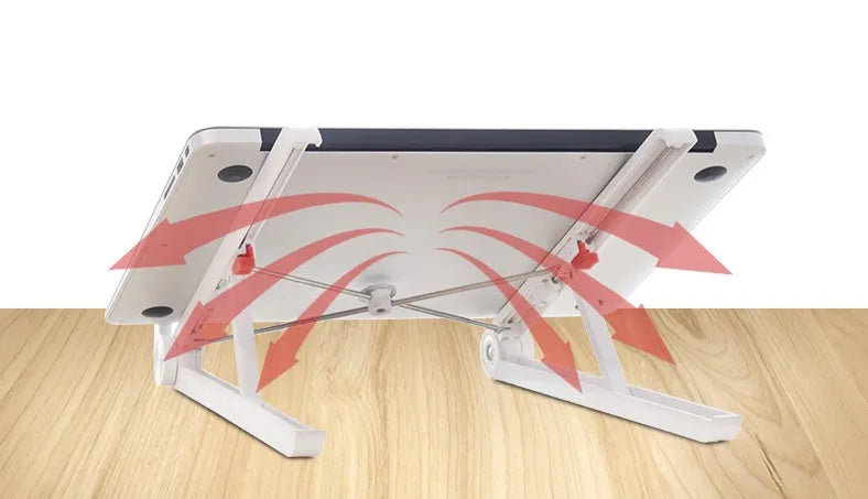White foldable laptop stand on a desk, showing its elevated, angled position for ergonomic use.