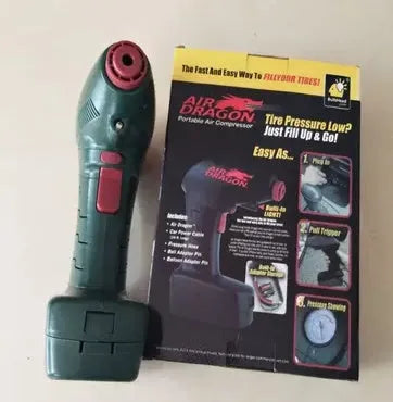 Portable 12V electric car tyre inflator with power cable and hose for emergency use.