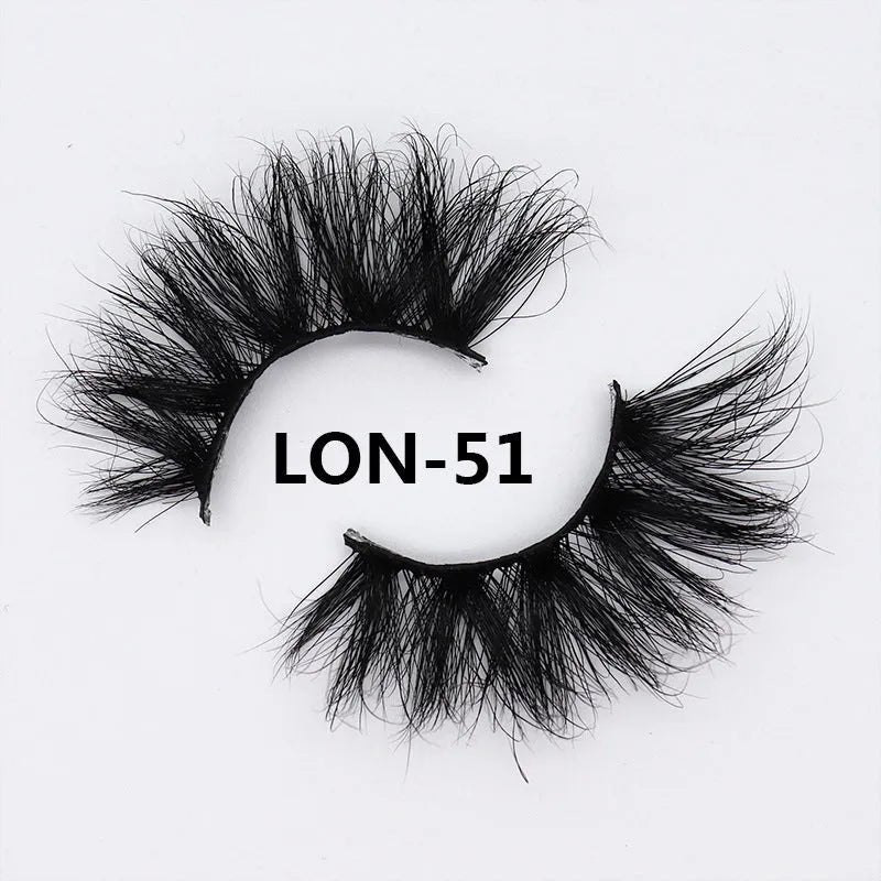 Real mink hair false eyelashes in 25MM3D length with fluffy handmade lash strands on a white background