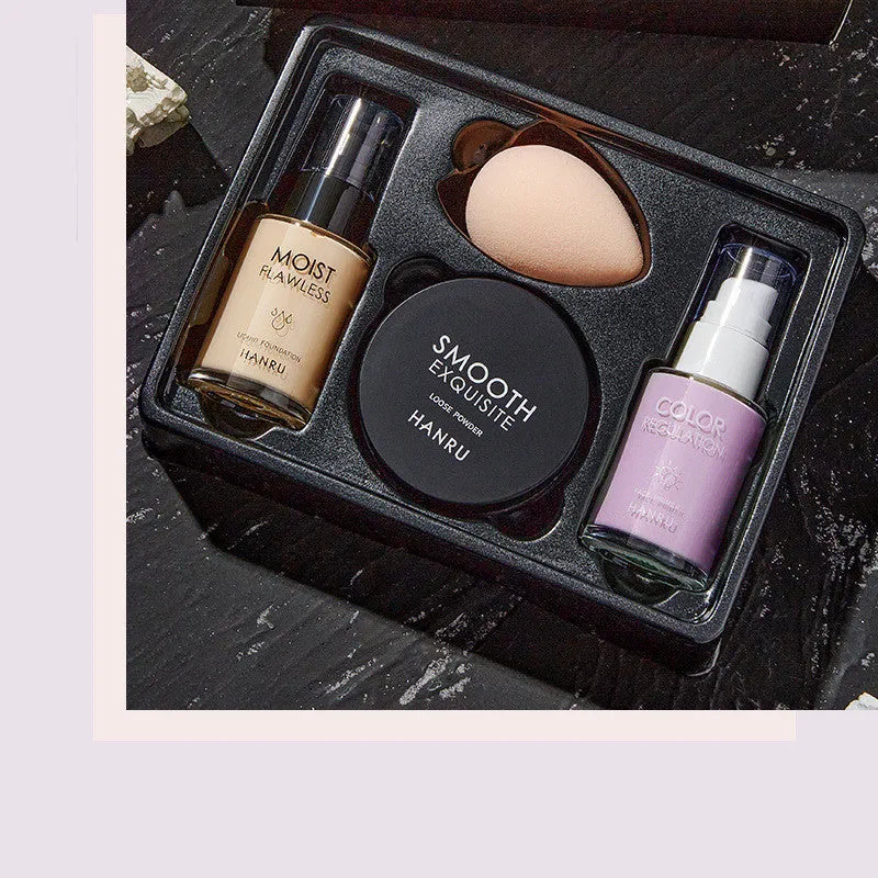 4-piece makeup set with liquid foundation, isolating milk, loose powder, and beauty egg sponge in ivory and green isolation colour option
