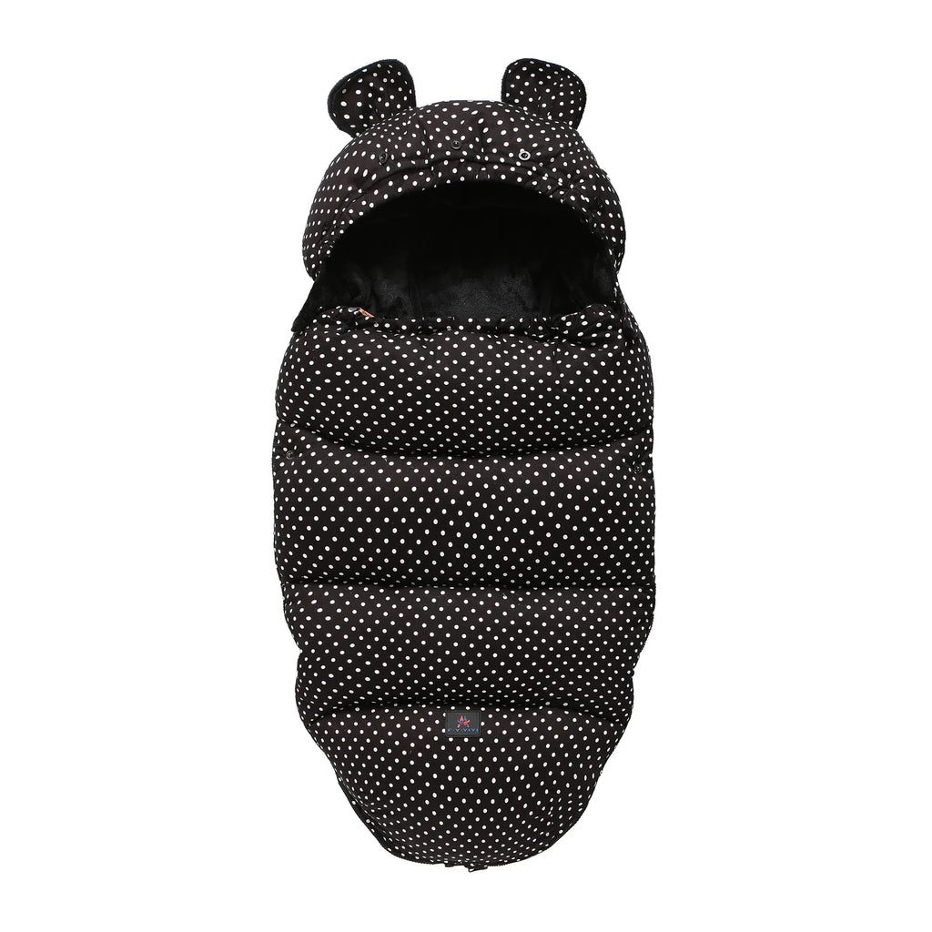 Convertible baby sleeping bag cocoon in a pram, showing cotton blend fabric and flannel lining.
