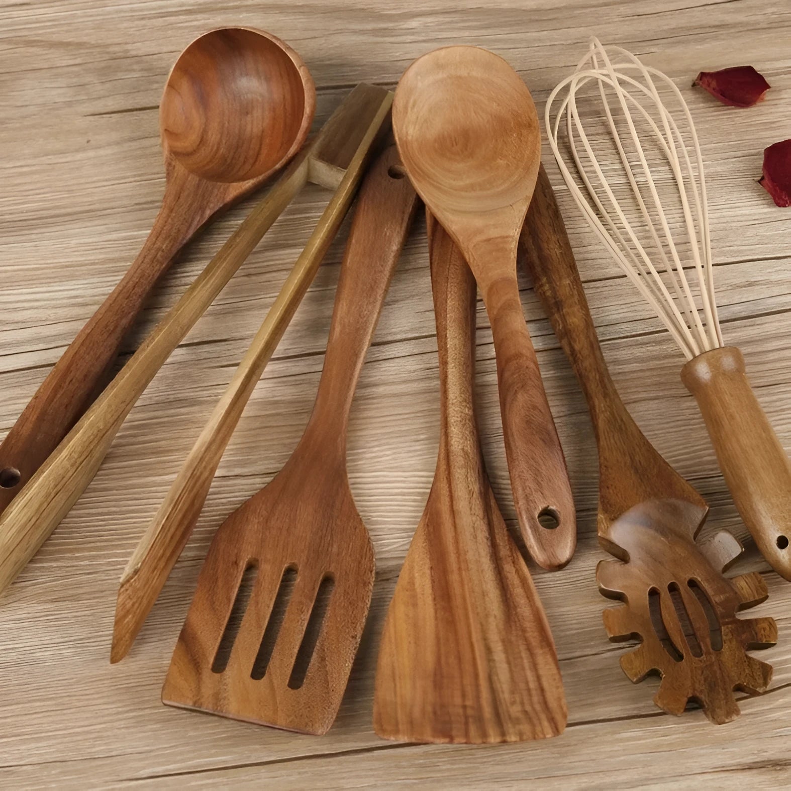 Wooden cooking utensil set with seven different kitchen tools including spoon and shovel