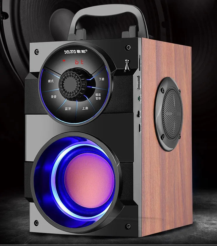 Black portable mini home audio system with subwoofer and 3.5mm audio connection cable