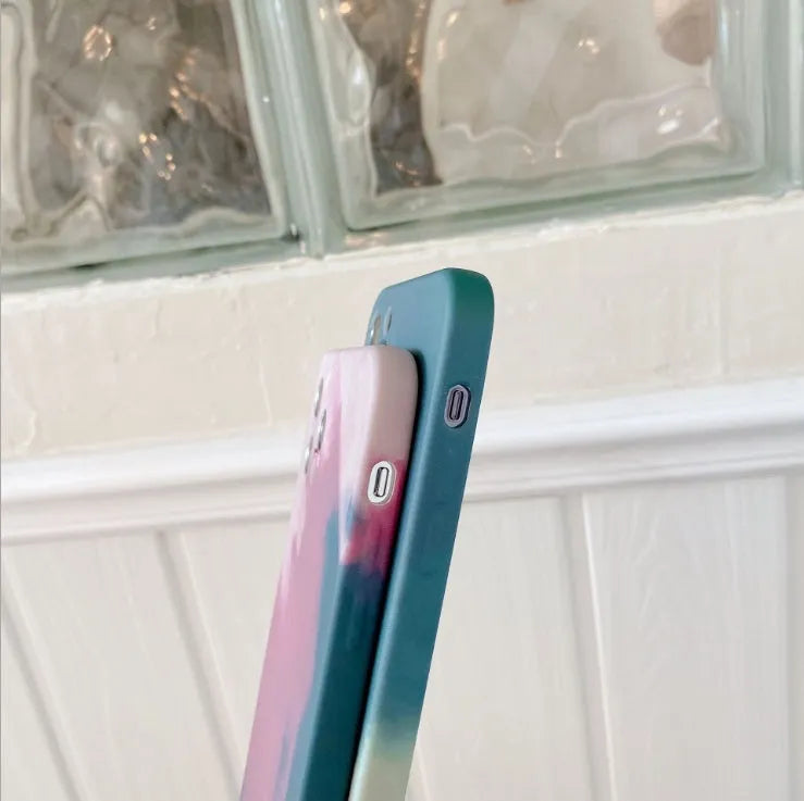 Soft silicone iPhone case with blue and purple gradient geometric abstract design