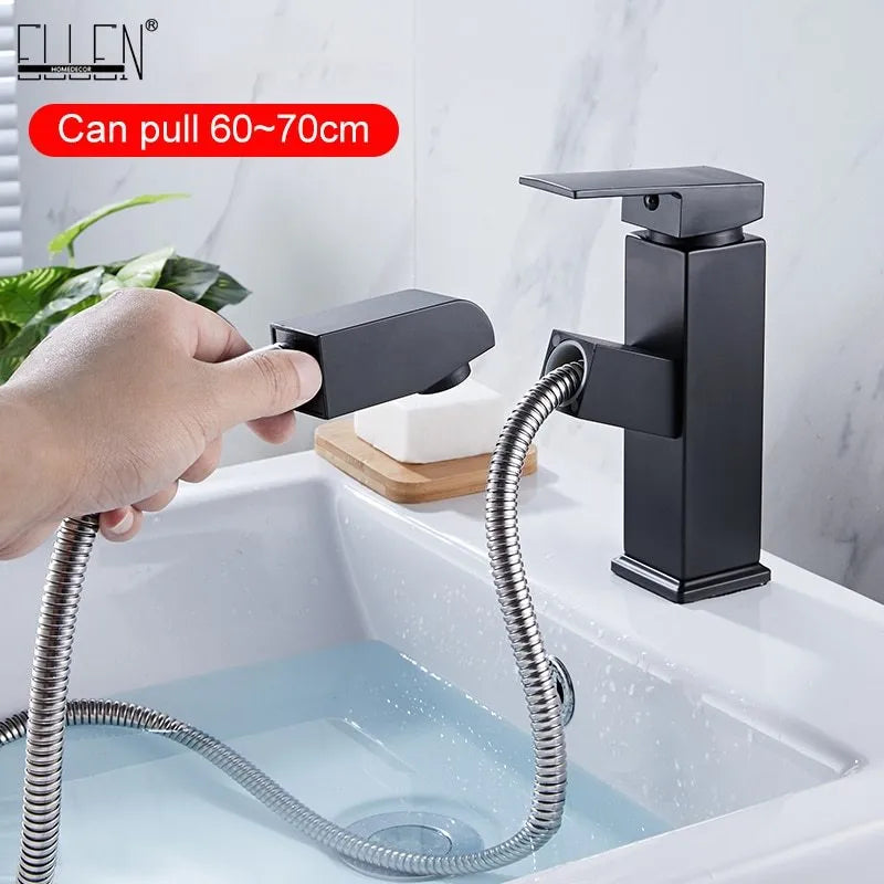Square handle brushed gold pull faucet with brass construction on a sink.