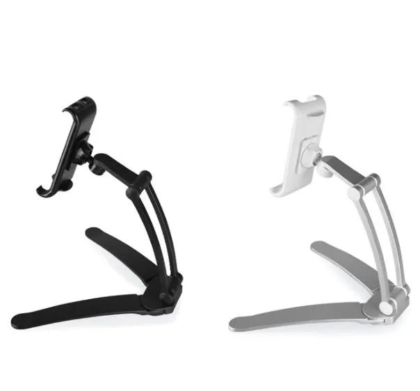 Silver aluminium alloy desktop tablet stand with adjustable holder and white mounting base on a wooden table.