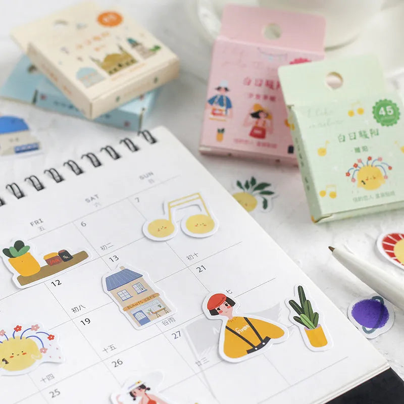 Boxed pack of 45 cartoon paper stickers with 15 patterns in 43x43mm size, featuring cute fruit designs