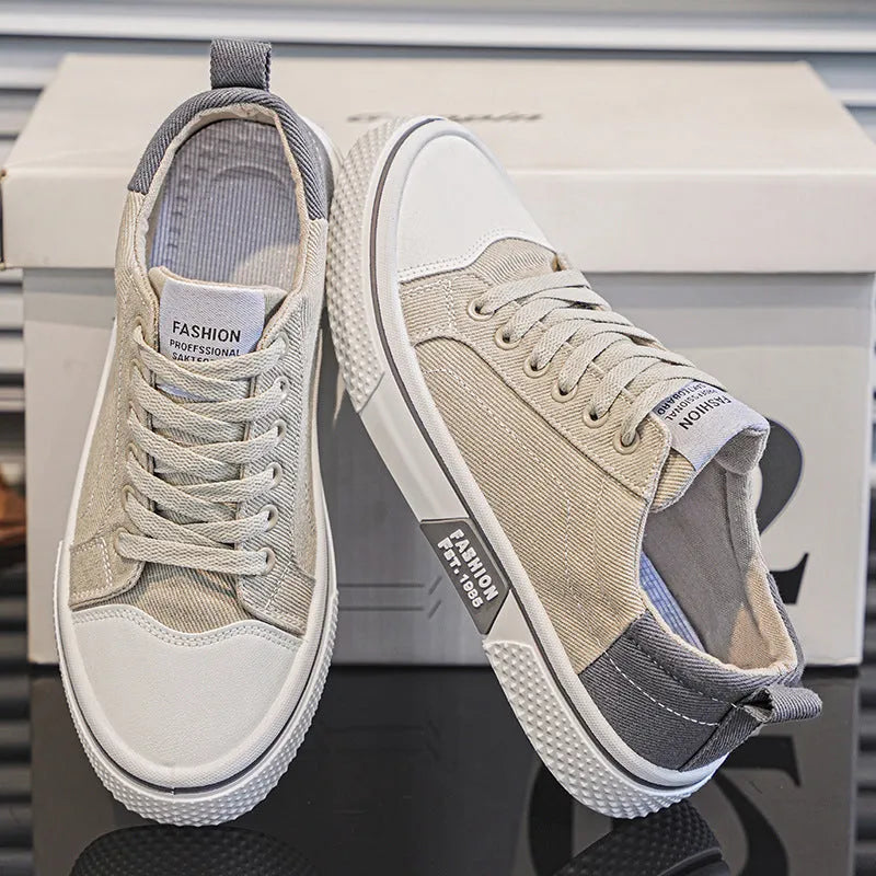 Men's blue canvas casual skateboarding shoes with round toe and lace-up front