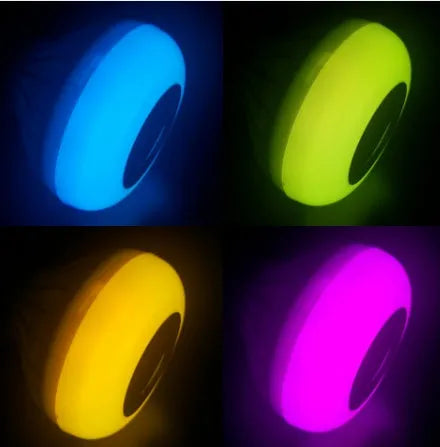 White Bluetooth speaker LED bulb with E27 base showing RGB colour illumination