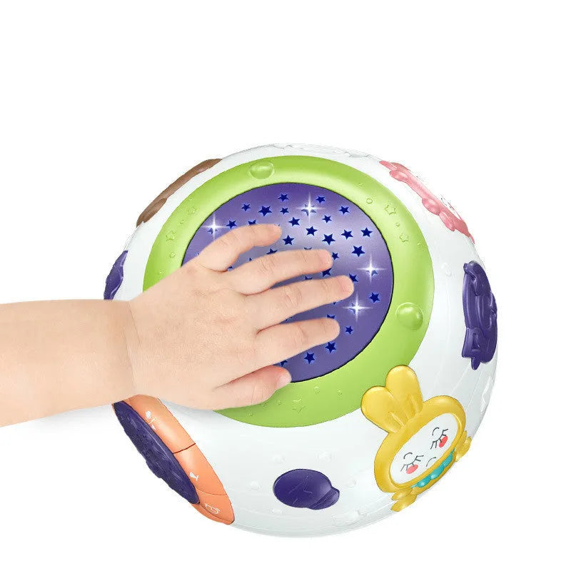 White cube-shaped children's night light projector showing starry sky projection with control button on top