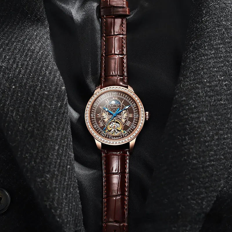 Men's waterproof mechanical watch with stainless steel strap and round dial on a wrist.