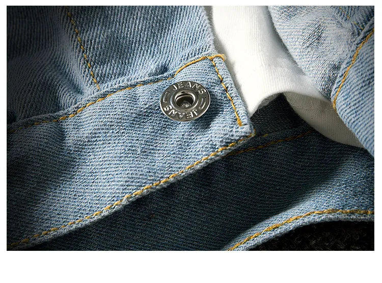 Blue loose-fit denim jacket with lapel collar and multiple pockets