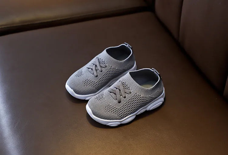 Children's fabric slip-on shoes with non-slip rubber soles in white, black, pink or grey colours