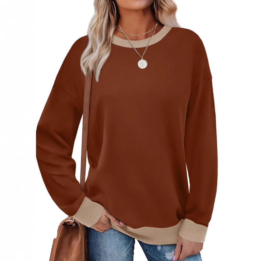 Women's loose striped long-sleeved top in polyester fabric showing round neck and seven colour options