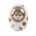 White Hamster space capsule-shaped hand warmer and power bank with USB port