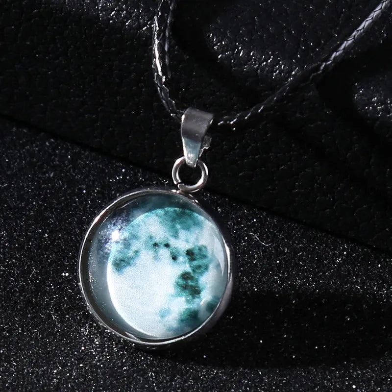 Moon night sky constellation glass pendant on a luminous alloy necklace chain with extension.