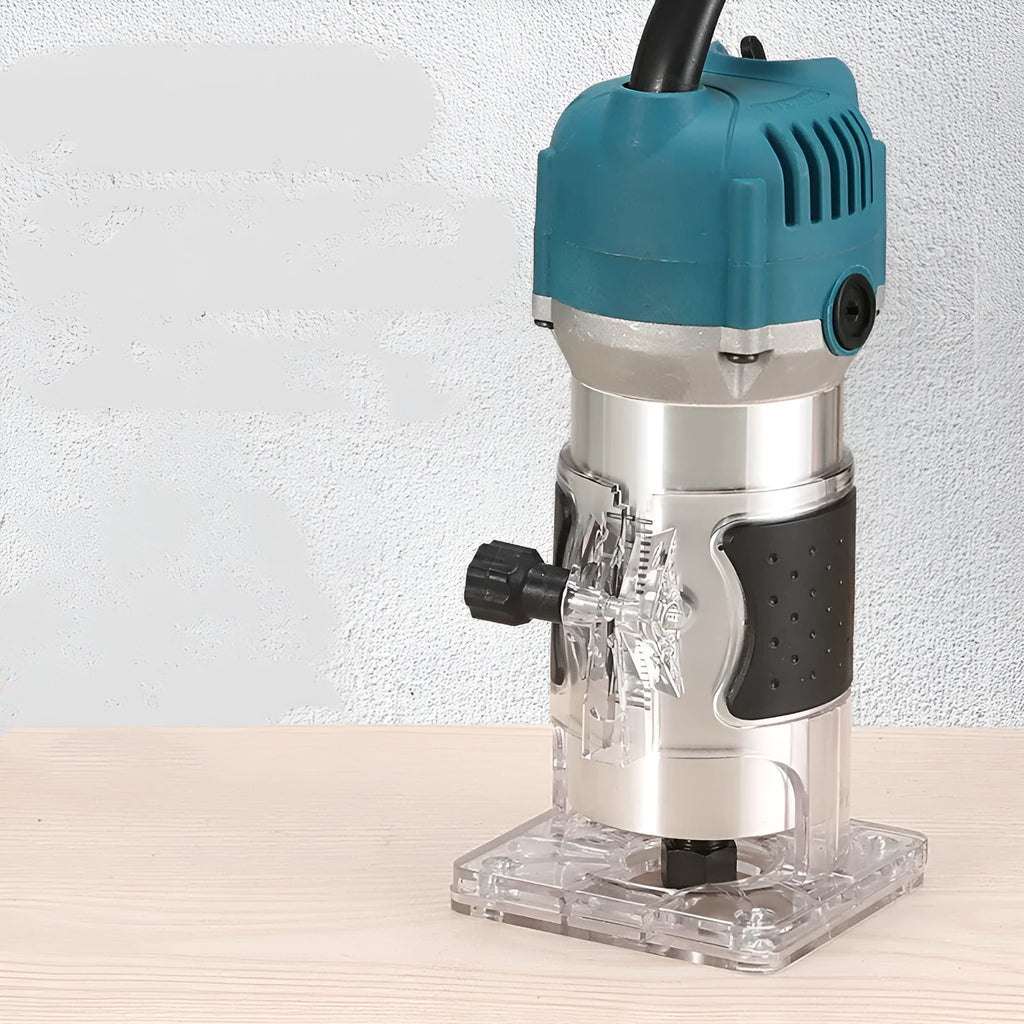 800W electric wood polishing trimmer with silver aluminium casing and a black handle on a workbench.